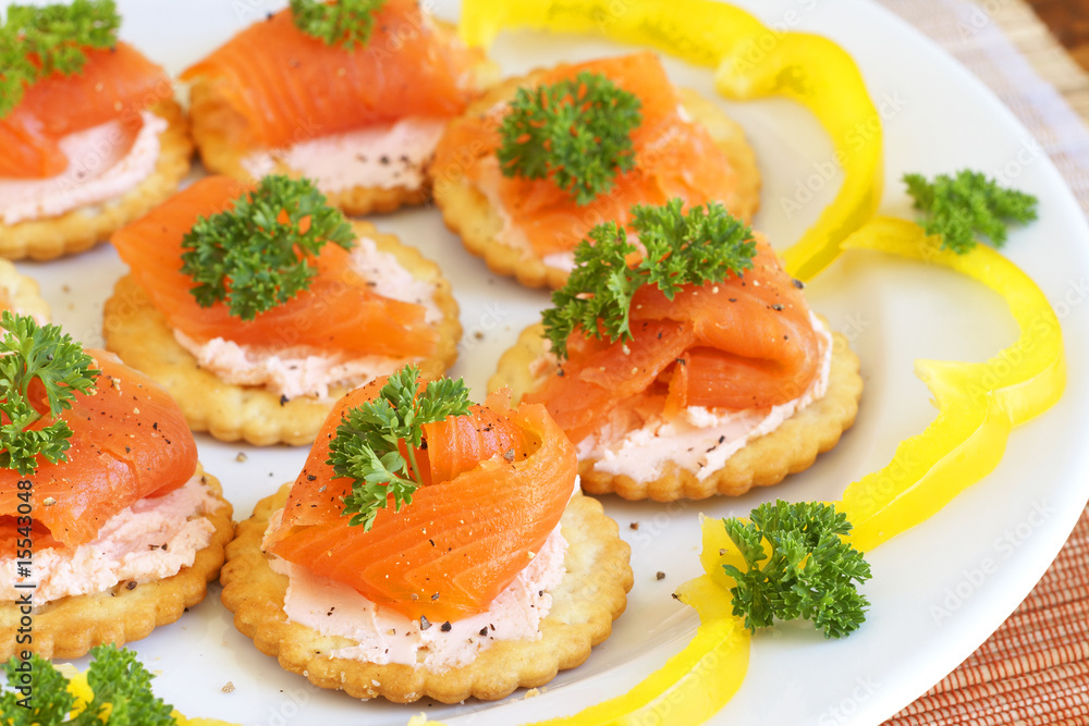 Smoked salmon and cream cheese on crackers Smoked salmon and cream cheese on crackers