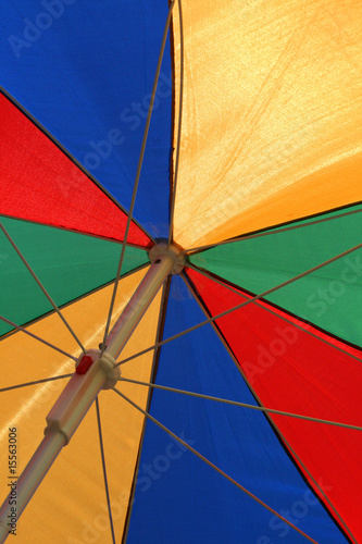 A colorful umbrela illuminated by the sun