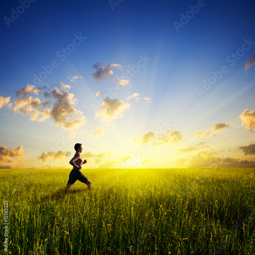 sunset and running young man