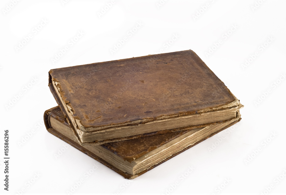 Stack of Old frayed books isolated over white Stack of Old frayed books isolated over white