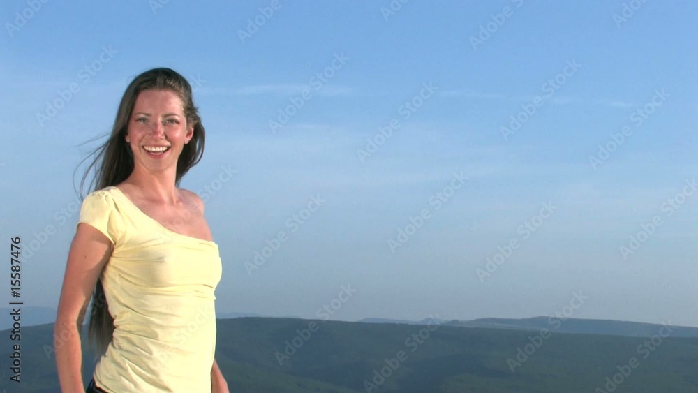 young woman smiling on a background of sky HD young woman smiling on a background of sky HD