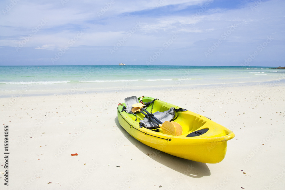 Rowboat on beach of Thailand