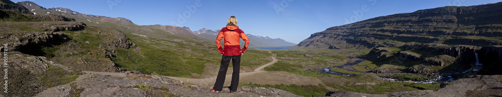 Woman Hiker Looking Down The Berufjordur Valley Iceland Woman Hiker Looking Down The Berufjordur Valley Iceland