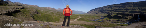 Woman Hiker Looking Down The Berufjordur Valley Iceland photo
