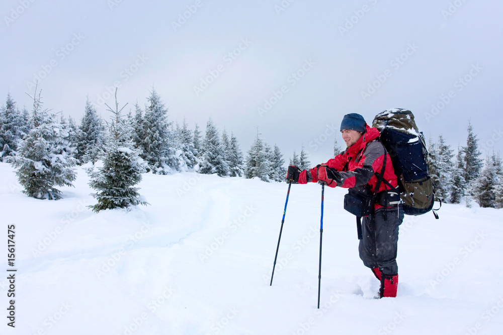 Hiker are in winter in mountains