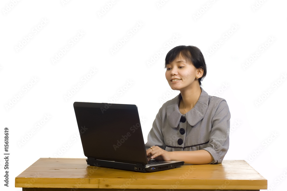 Business Woman Using Laptop on White Background and Smiling Business Woman Using Laptop on White Background and Smiling