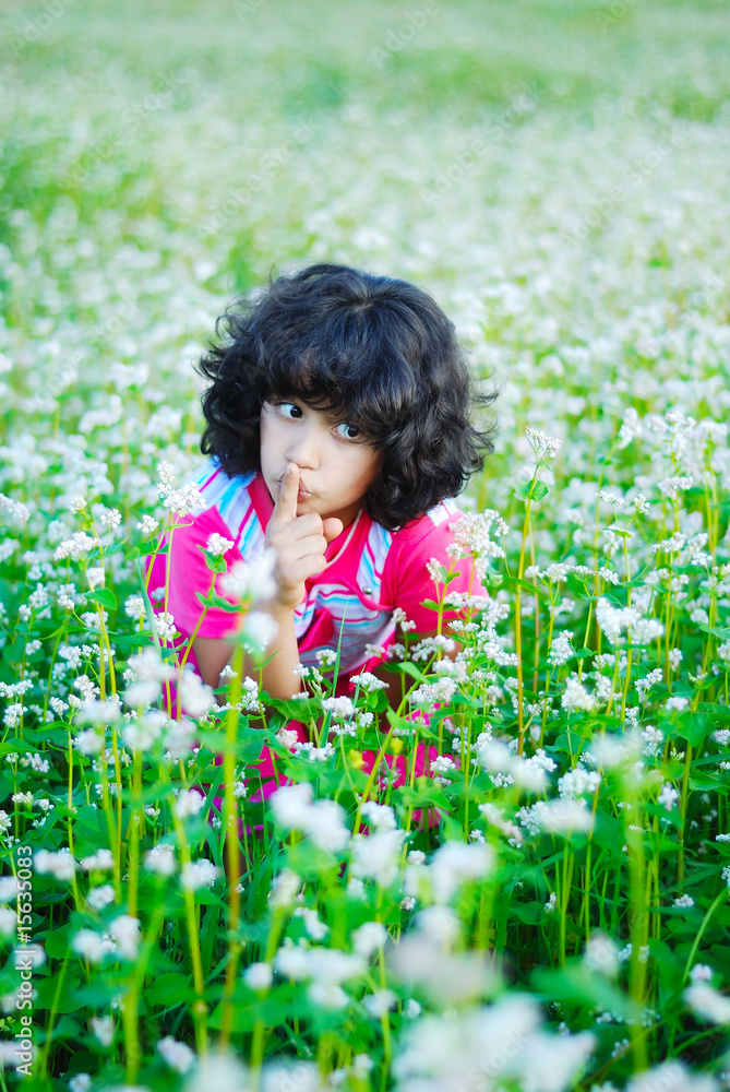 Adorable girl on green grass Adorable girl on green grass