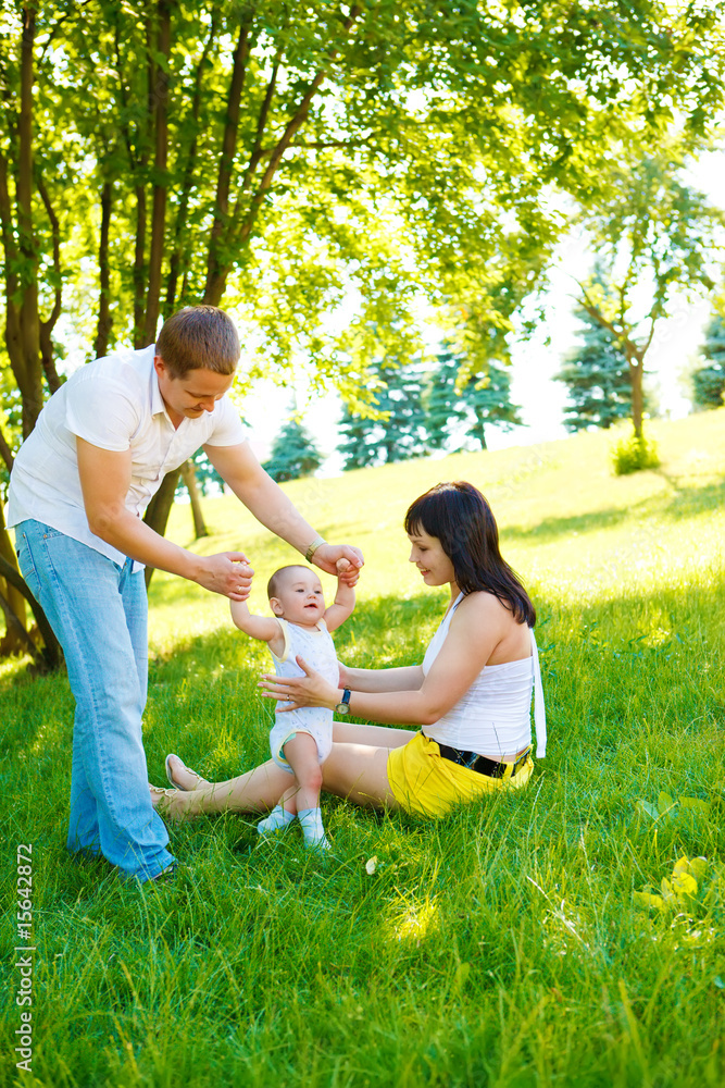 Fototapeta premium Baby making first steps