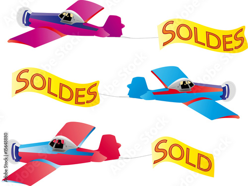 soldes, bannière à la traine d'un avion