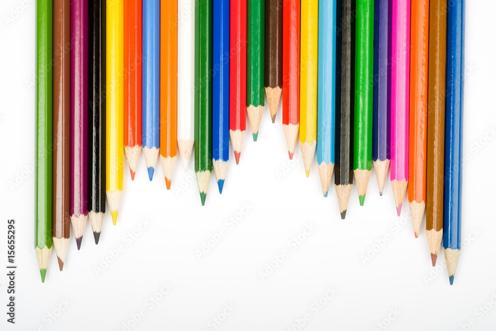 Assortment of coloured pencils with shadow on white background Assortment of coloured pencils with shadow on white background