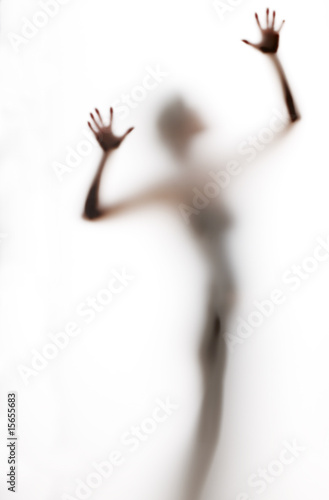 Fototapeta Naklejka Na Ścianę i Meble -  abstract, elongated, semi-obscured figure with arms raised