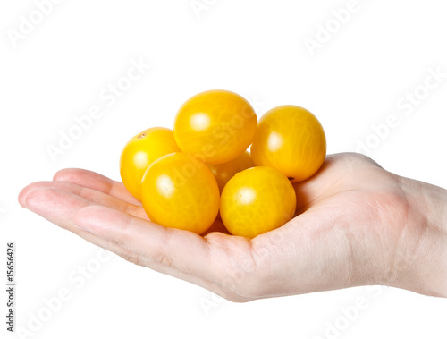 handful of  yellow tomatos