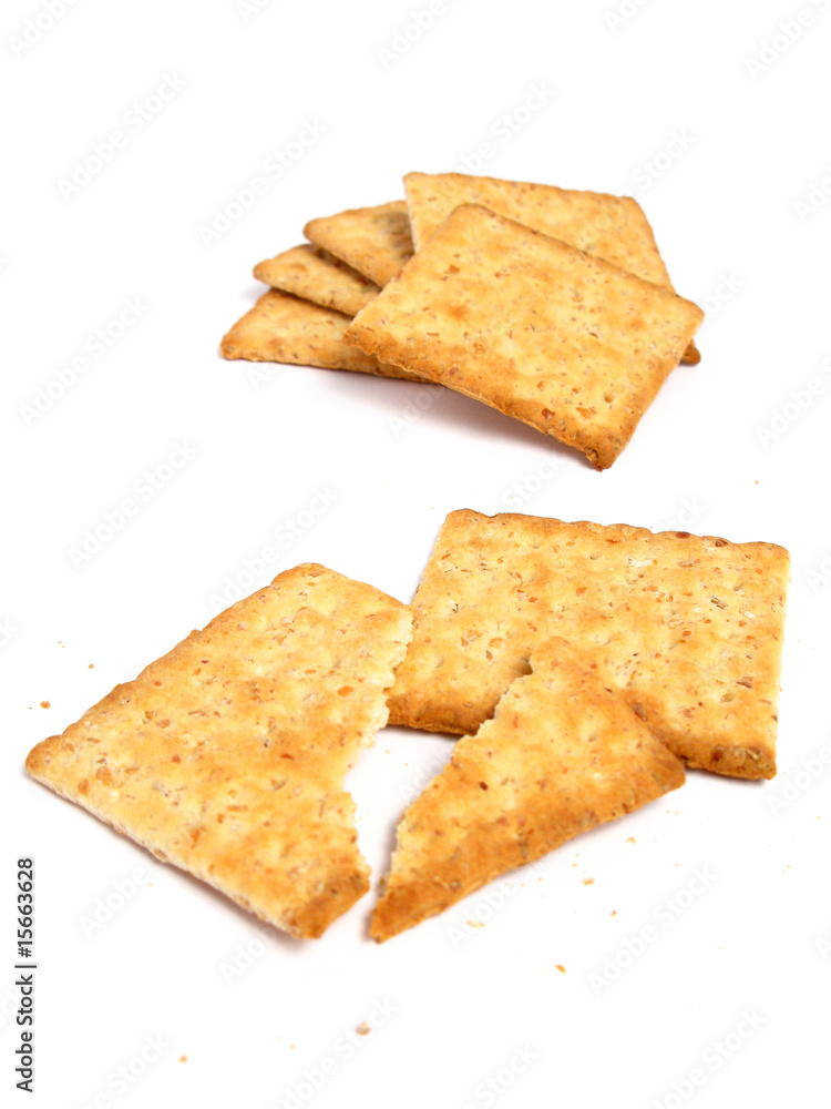 Fototapeta premium Stack of crackers on white background