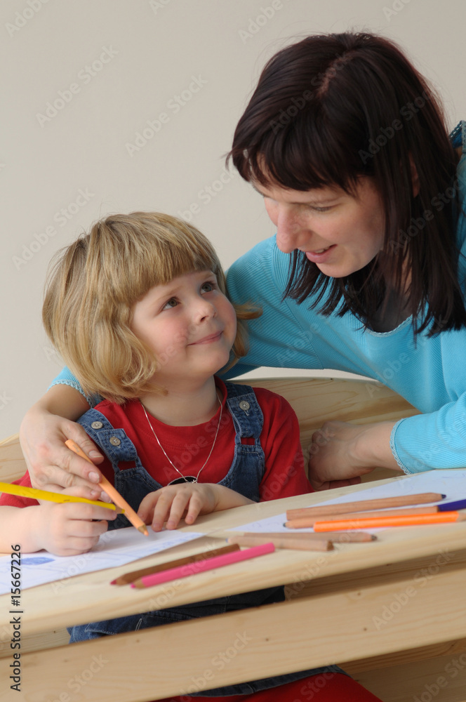 The mother with daughter during the drawing The mother with daughter during the drawing