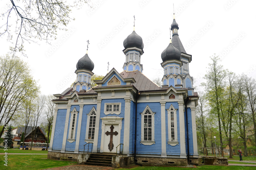 Fototapeta premium The old wooden blue church in Lietuva