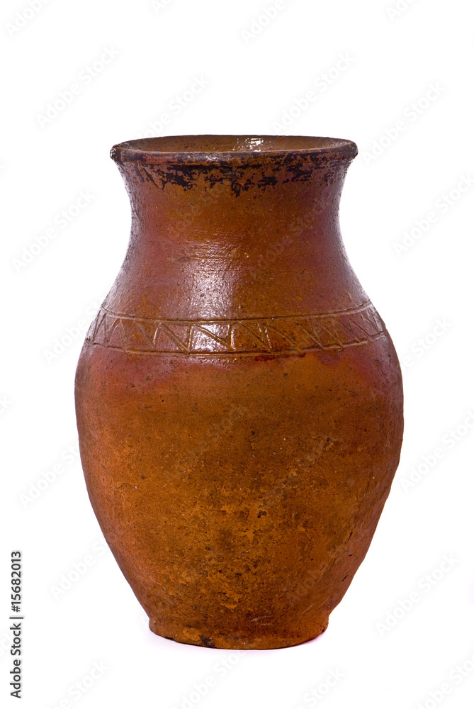 Old jug on white background, studio shot