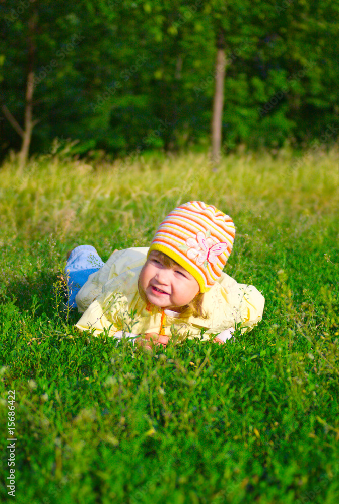 Smiling little girl at summer forest Smiling little girl at summer forest