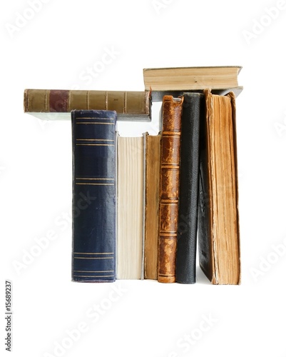 Stack of old books standing isolated