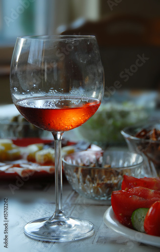 Wineglass with highlighted rose wine