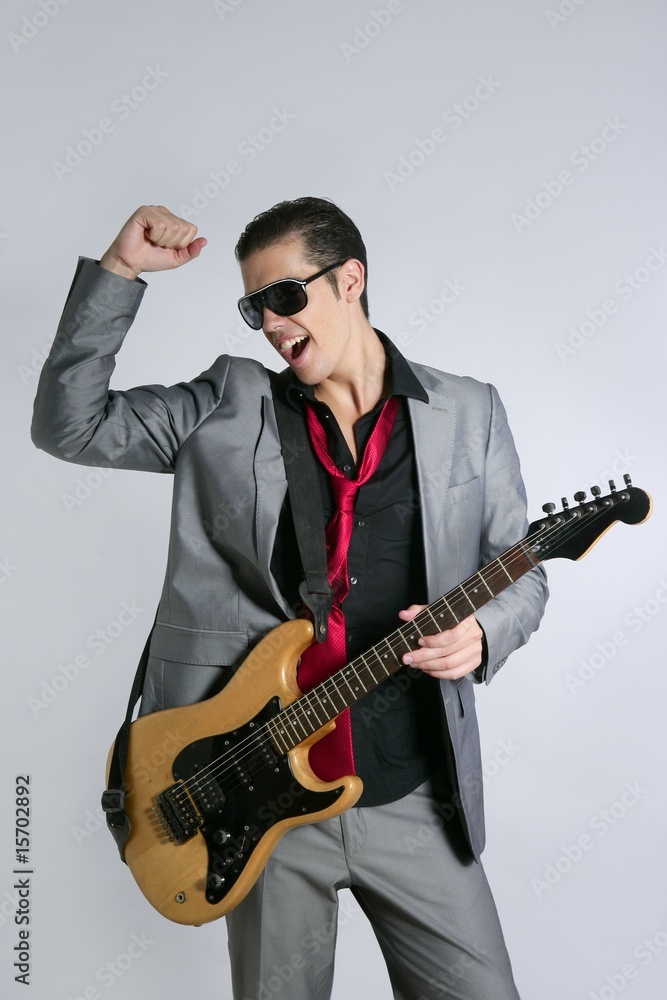 Businessman musician playing instrument with suit