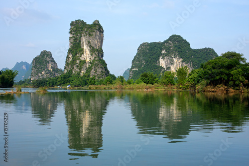 Limestone hills reflected in the Li-river, Yangshou, China