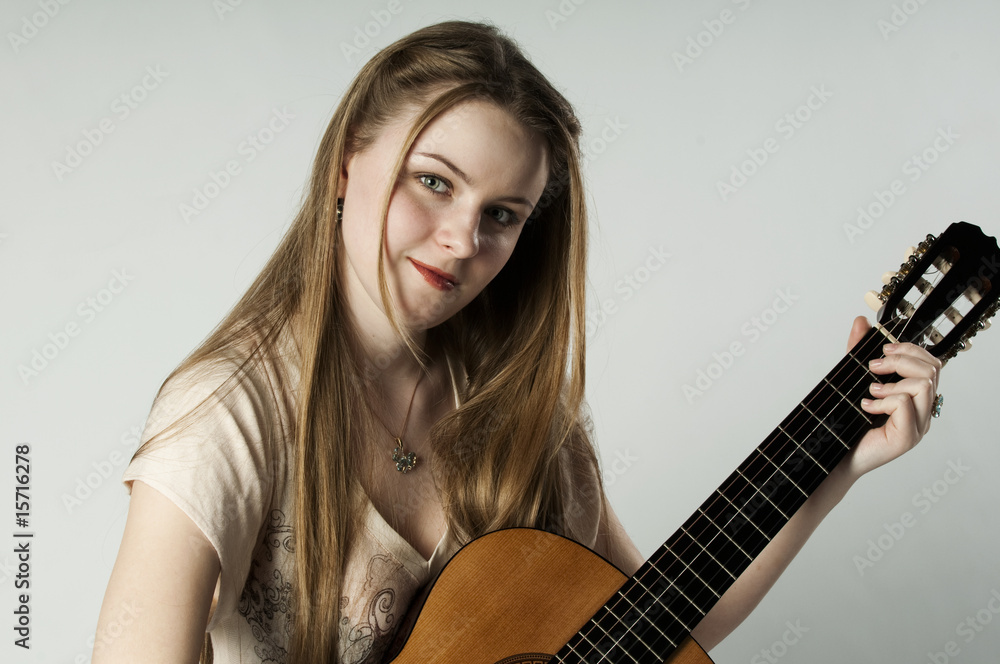 Beautiful girl with guitar