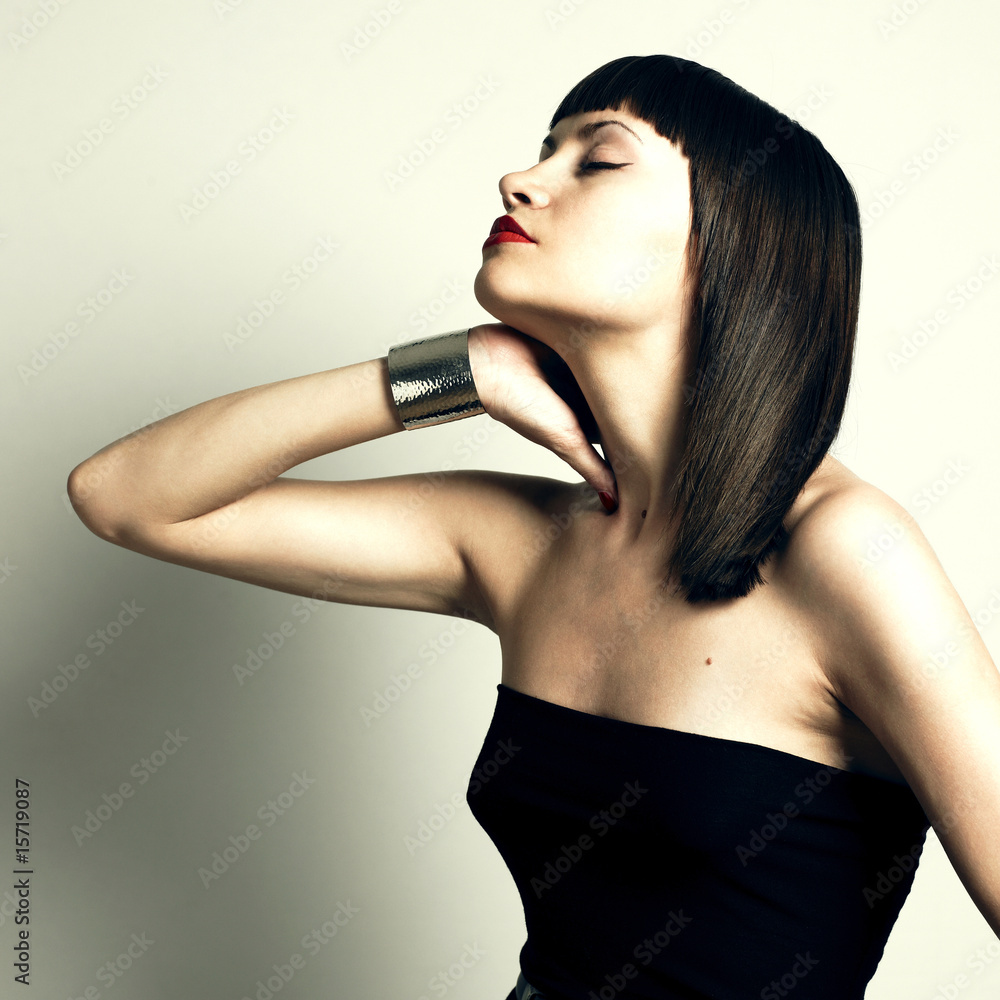 Naklejka premium Young stylish woman in bracelet