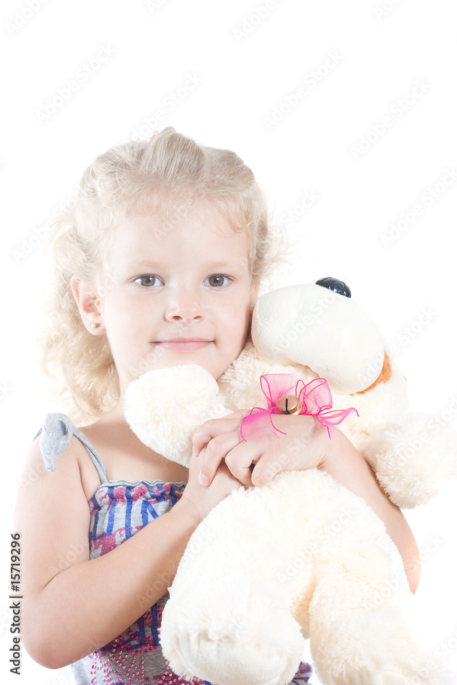 Little girl is hugging big teddy Little girl is hugging big teddy