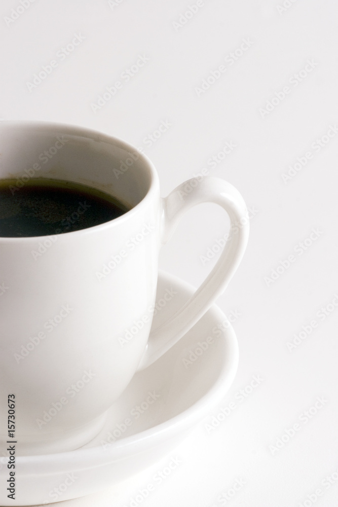 Cup of Coffee on white plate and white background Cup of Coffee on white plate and white background