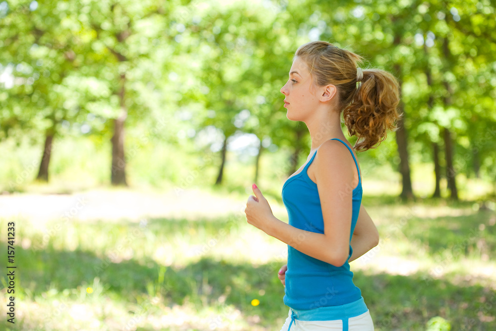 Sporty blonde girl doing fitness outdoor Sporty blonde girl doing fitness outdoor