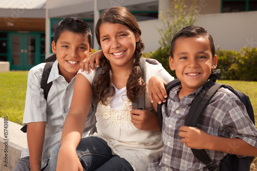 Cute Brothers and Sister Ready for School
