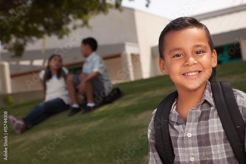 Happy Young Hispanic Boy Ready for School