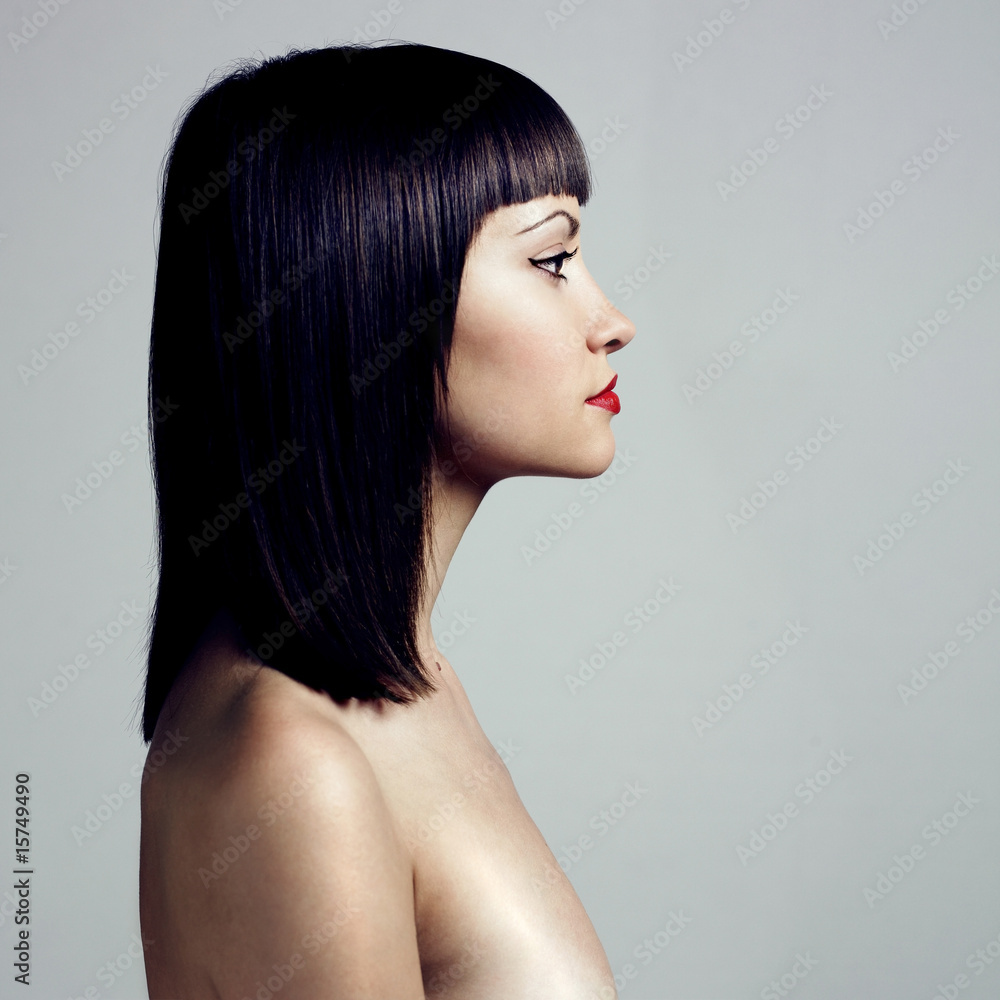 Fototapeta premium Profile of woman with strict hairstyle