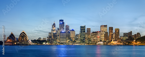 Panoramic view of Sydney skyline with blue sky