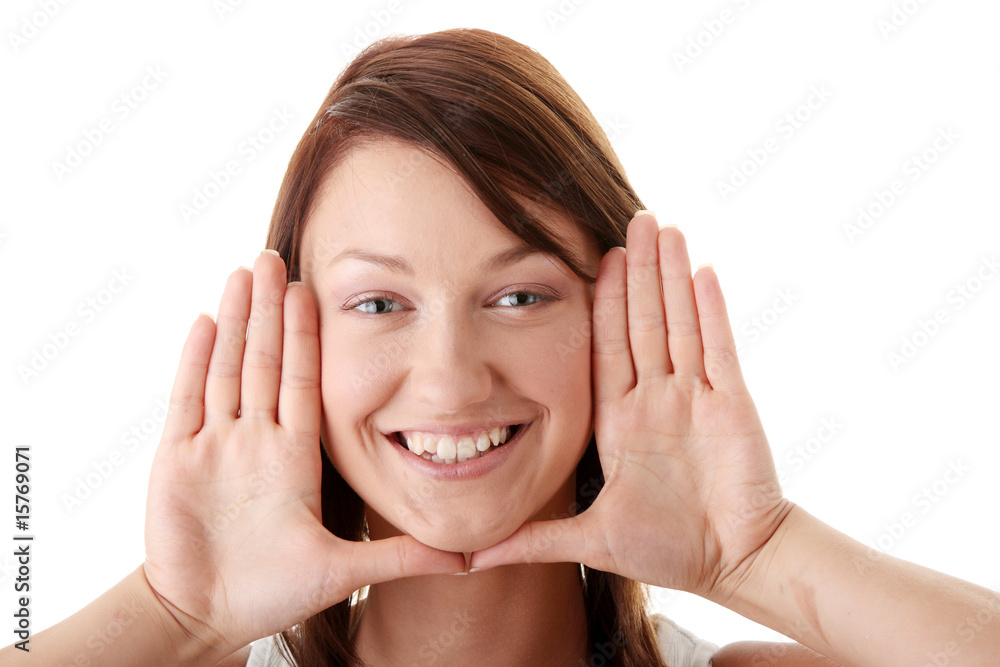Woman framing her face with her hands Woman framing her face with her hands
