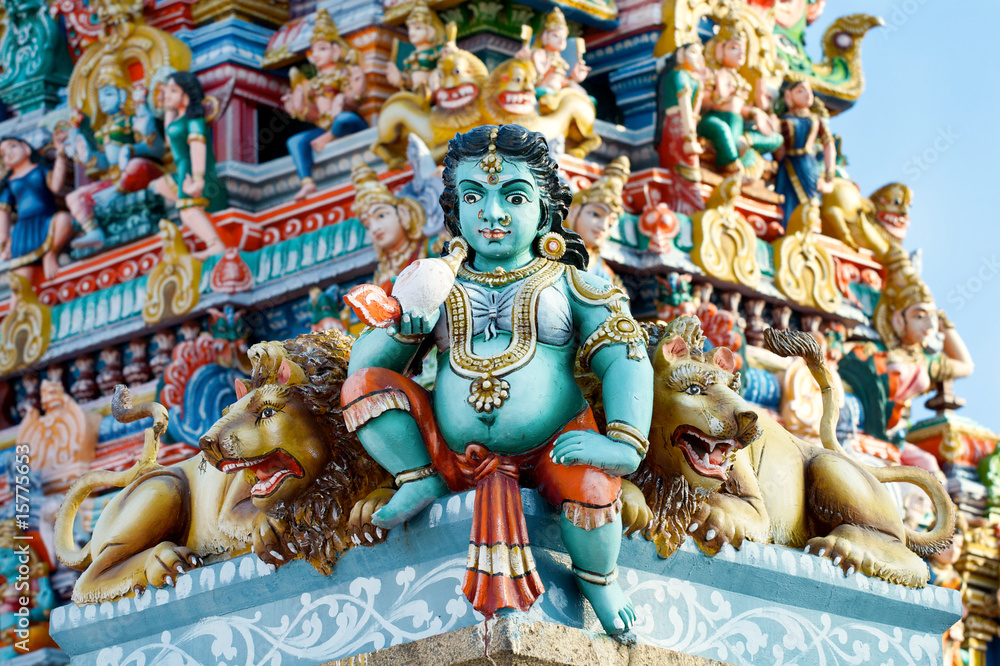 Hindu God figure on the gate to the temple