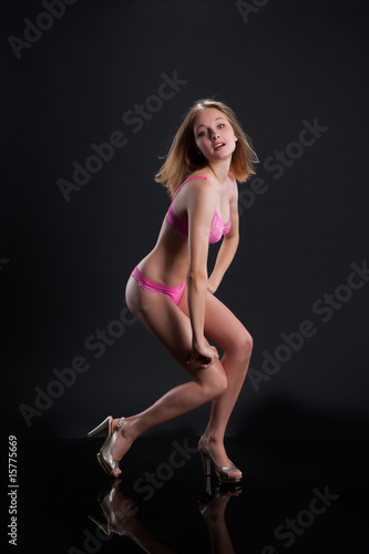 Young Woman In Pink Lingerie
