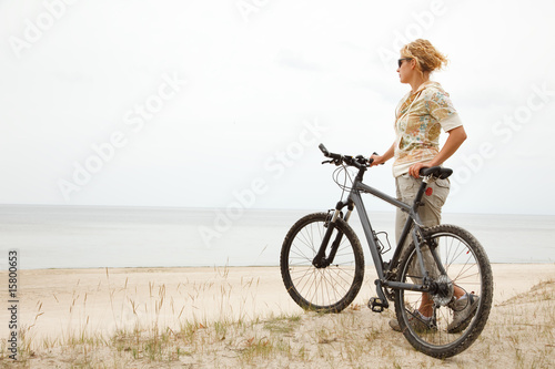 Young women with bicycle