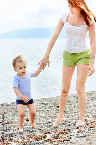 loving mother and son on beach