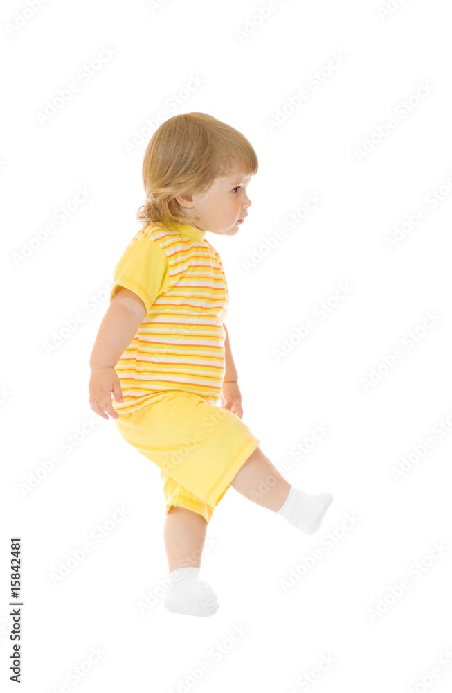 Walking girl in yellow shirt and pants Walking girl in yellow shirt and pants