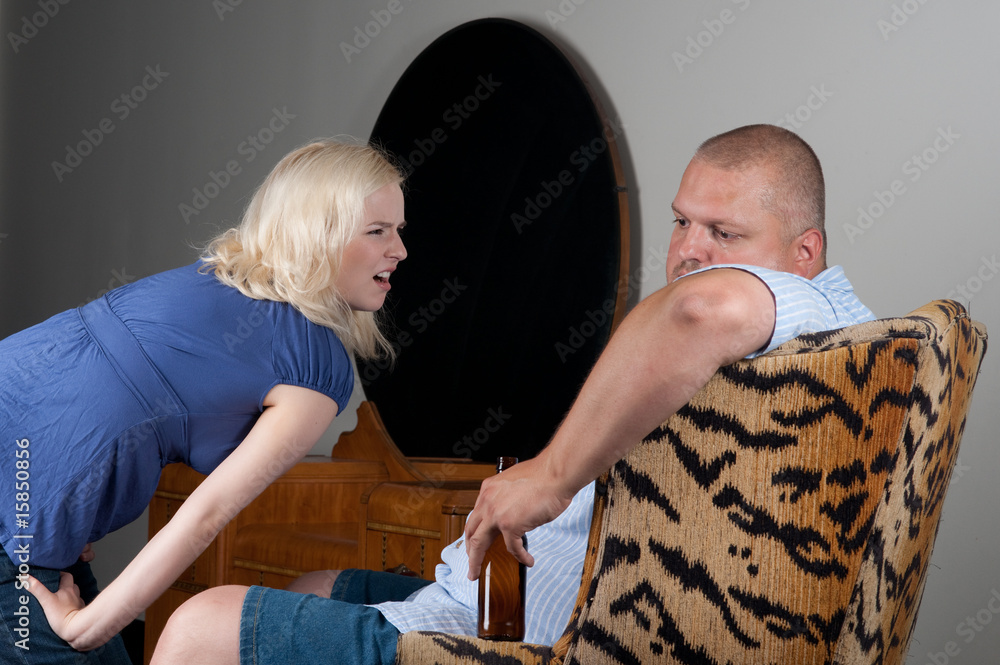 Fototapeta premium Couple arguing about alcohol addiction