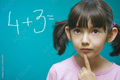 Pretty girl learning math.