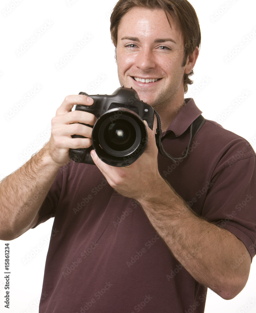 A portrait of a attractive man holding a camera A portrait of a attractive man holding a camera