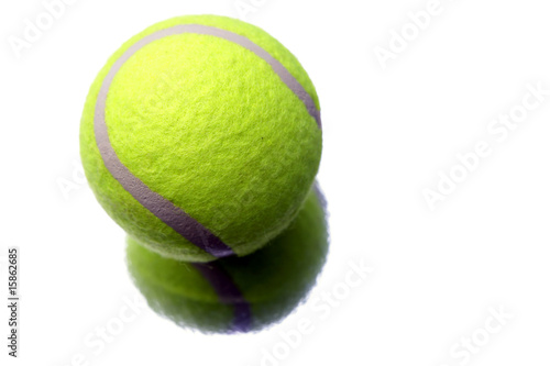 Tennis ball isolated on white © Stillfx