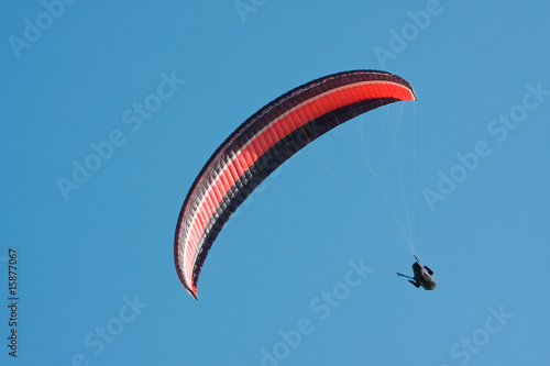 Paragliding pilot in the air