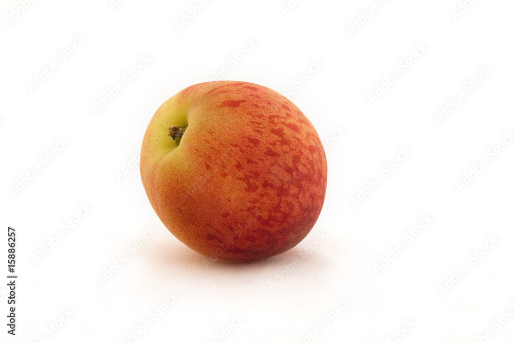 Nectarine set against a white background Nectarine set against a white background