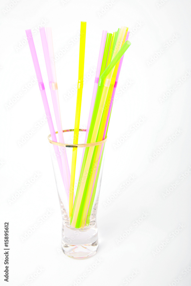 Plastic drinking straws in glass Plastic drinking straws in glass