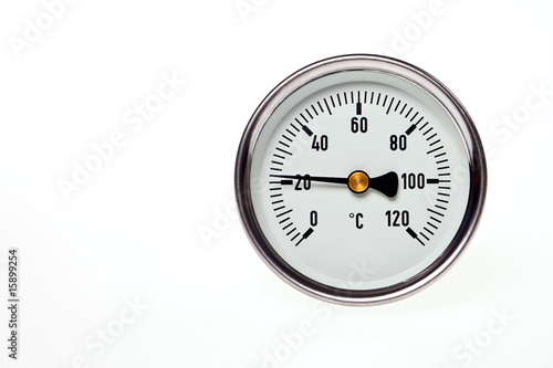 A circular thermometer on a white background.