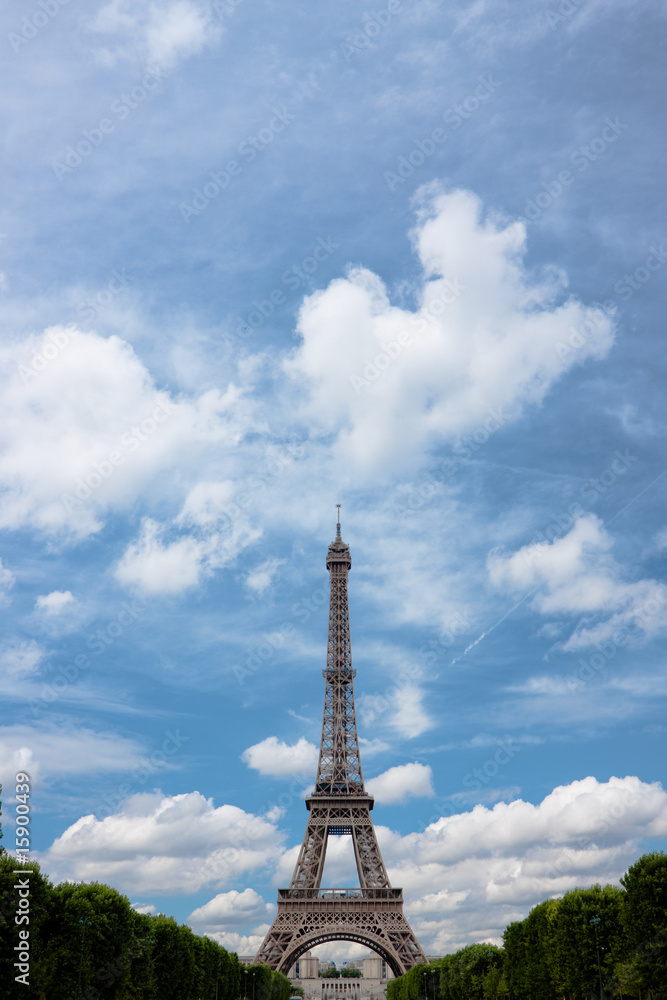 Eiffel tower with clouds. Portrait. Copy space.
