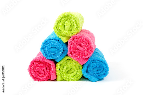 Colorful towel rolls on a white background